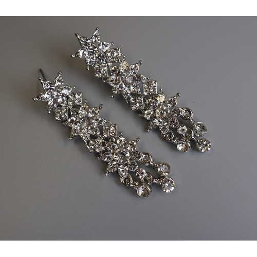 64 - Pair of blingy earrings