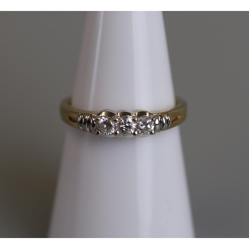 76 - Gold 3 stone diamond ring - Size L½