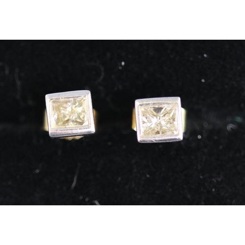 90 - Pair of 18ct gold earrings set with princess cut diamonds