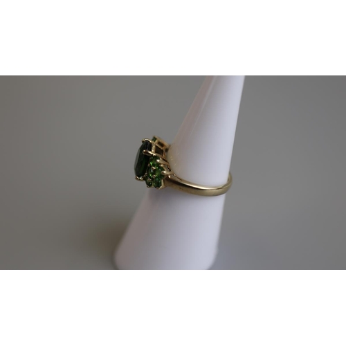 103 - Gold semi-precious stone set ring - Size K