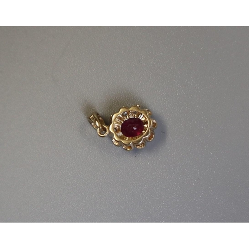 111 - Gold ruby & diamond pendant