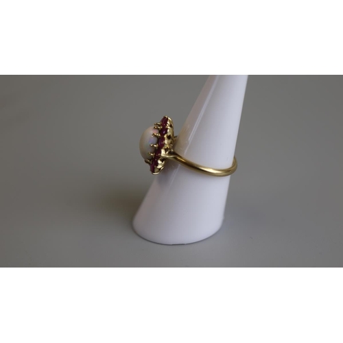 130 - 18ct gold opal & ruby set ring - Size M½