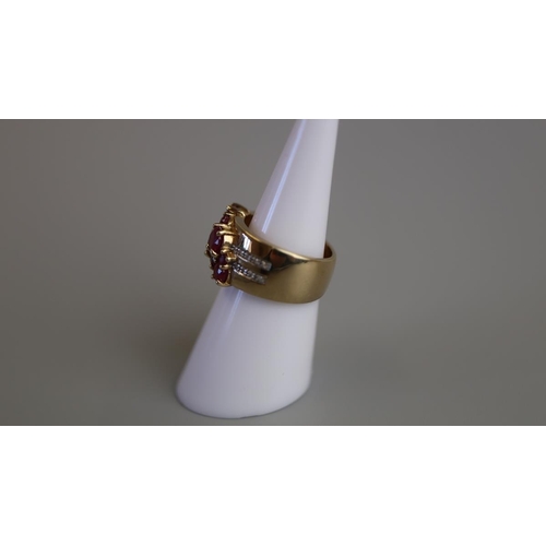 149 - Unusual gold ruby & diamond set ring - Size L