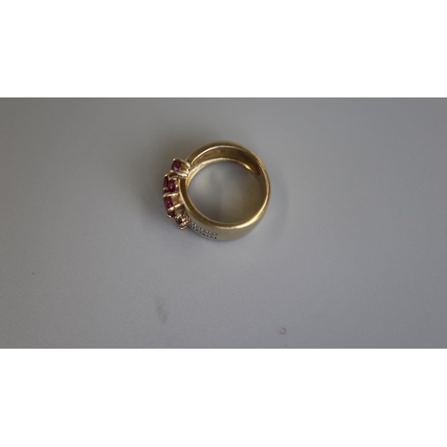 149 - Unusual gold ruby & diamond set ring - Size L