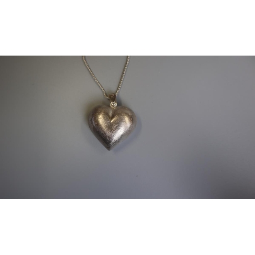 193 - Large silver heart pendant on silver chain