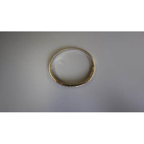 196 - Fine gold & diamond bangle