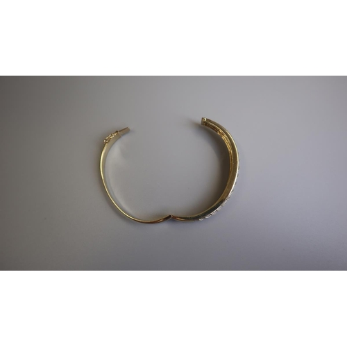 196 - Fine gold & diamond bangle