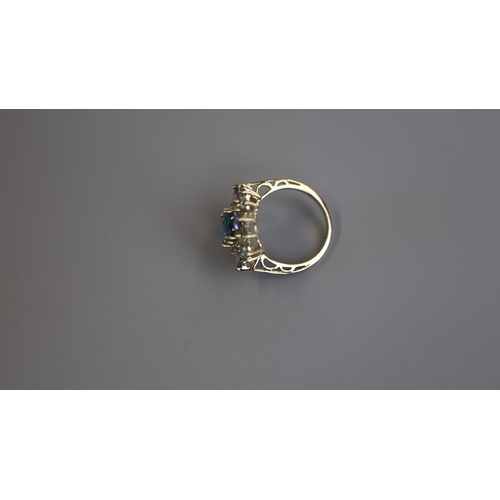 203 - Gold blue topaz set ring - Size K