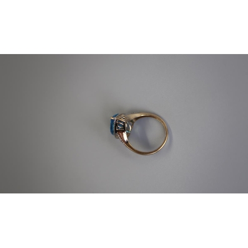 238 - Gold blue topaz & diamond set ring - Size M½