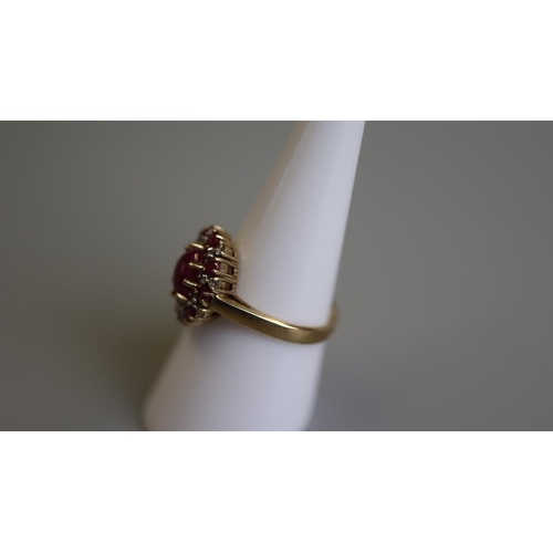 242 - Gold ruby & diamond set ring - Size O