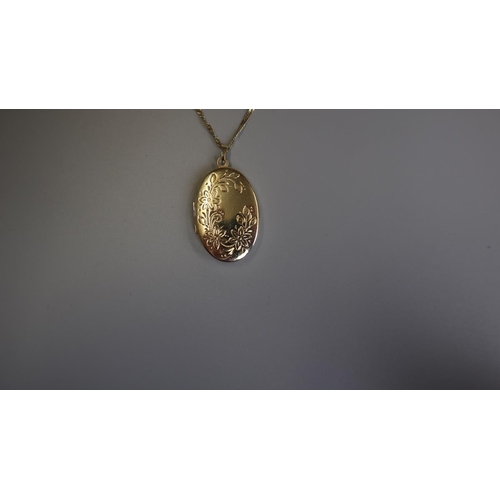 255 - Gold locket on chain - Weight 7g