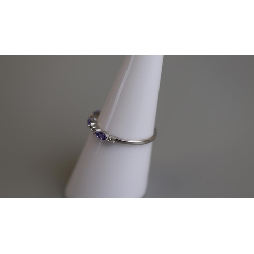 271 - White gold tanzanite & diamond set ring - Size M½