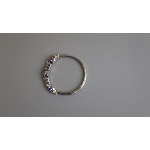 271 - White gold tanzanite & diamond set ring - Size M½