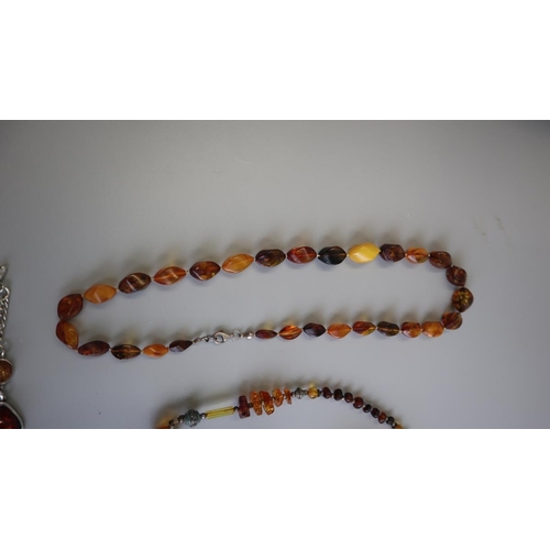 305 - Amber necklaces and bracelets