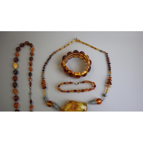 305 - Amber necklaces and bracelets