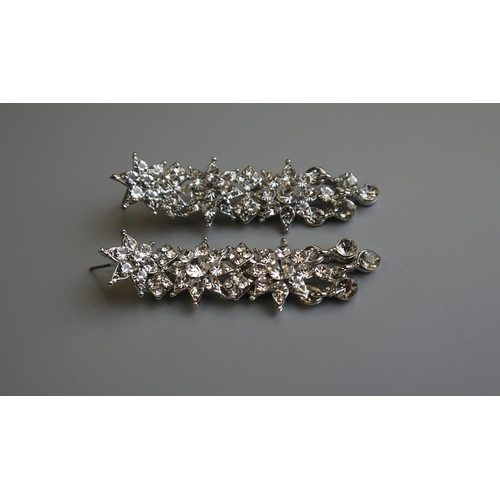 64 - Pair of blingy earrings