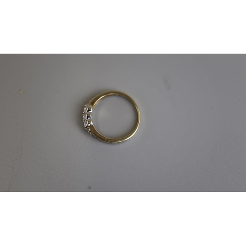 76 - Gold 3 stone diamond ring - Size L½