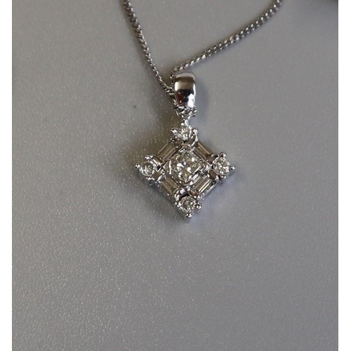 78 - White gold baguette diamond pendant on chain together with a matching pair of earrings