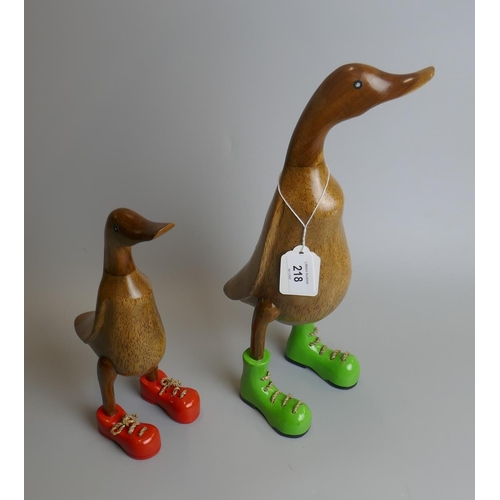218 - 2 wooden duck's in boots