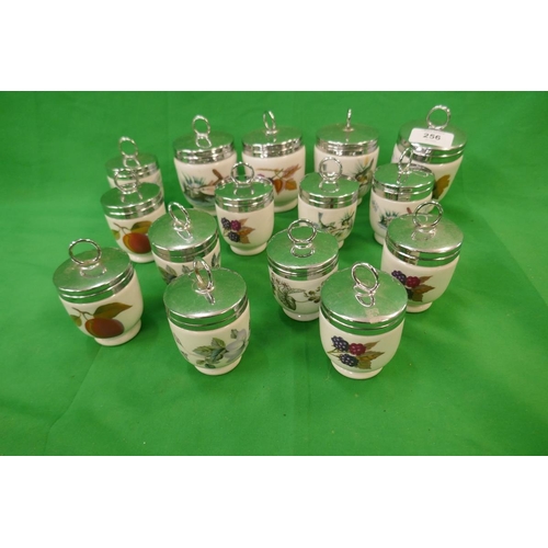 256 - Collection of Royal Worcester egg coddlers