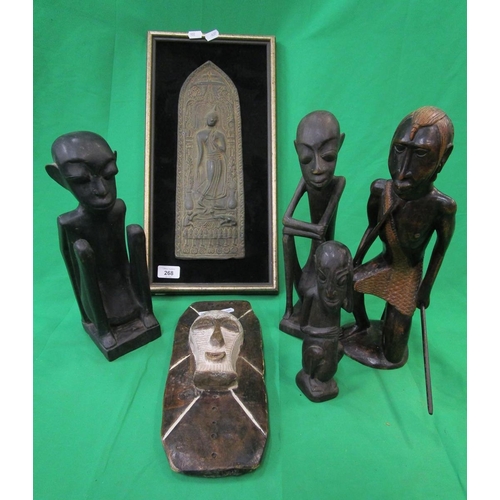 268 - Collection of African tribal figures together with a framed plaque of a dancing Buddha