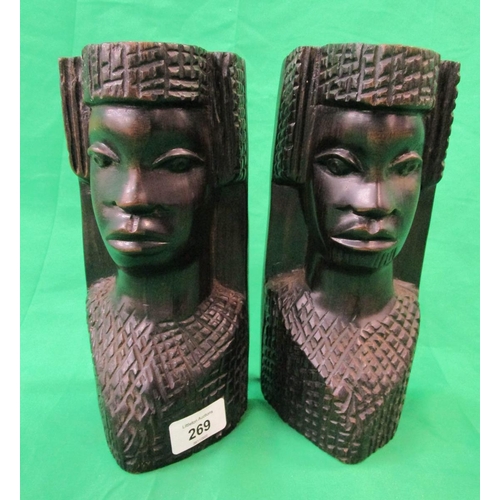 269 - Pair of carved wooden bookends