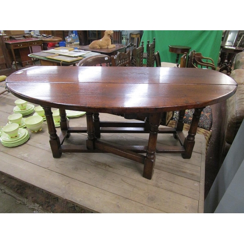 274 - Oak drop leaf coffee table