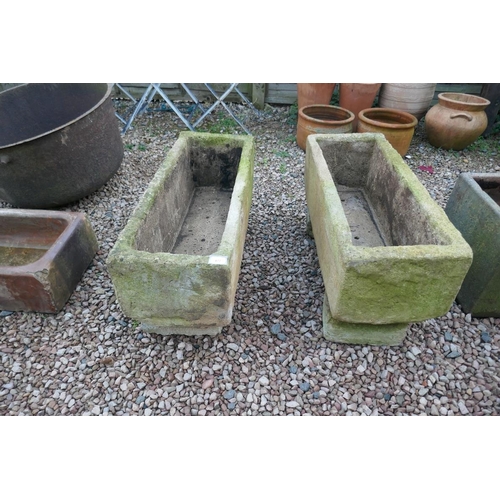 477 - Pair of stone troughs on feet