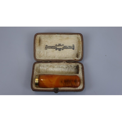 91 - Amber and gold cigarette mouthpiece 