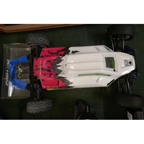 263 - Team Associated RC10 brushless radio controlled car with Li-po battery, controller, spare shell etc.