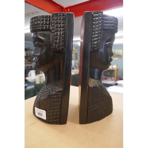 269 - Pair of carved wooden bookends