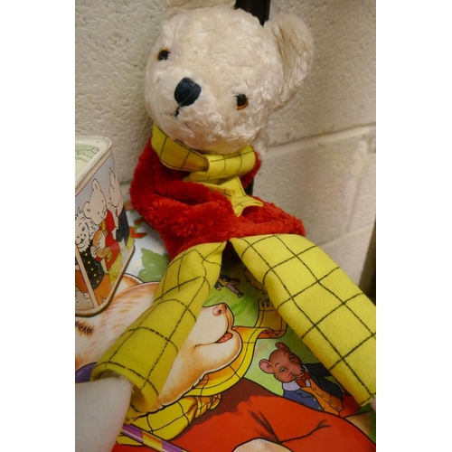 336 - Rupert Bear collectables to include albums, money box and hand puppet together with other albums Bea... 