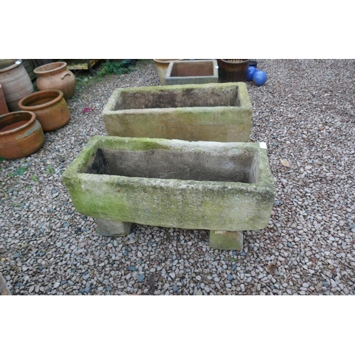 477 - Pair of stone troughs on feet