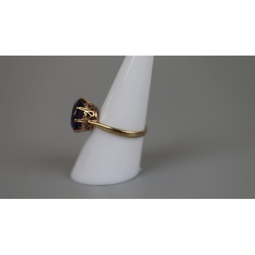61 - Gold amethyst set ring - Size: O½