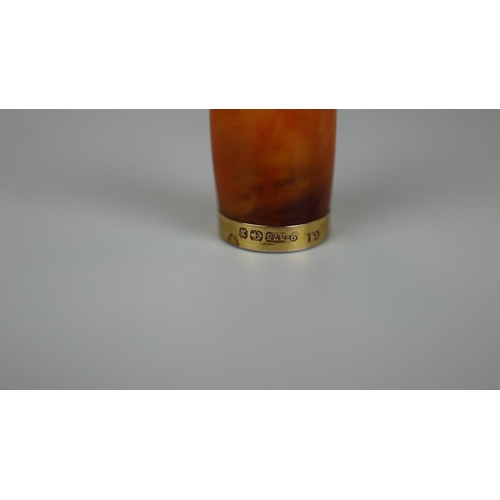 91 - Amber and gold cigarette mouthpiece 