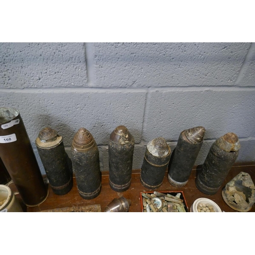 168 - WWI battle site finds to include shells and barbed wire etc