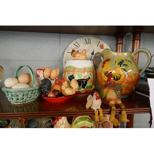 235 - Collection of chicken themed items to include clock, plates and biscuit barrels