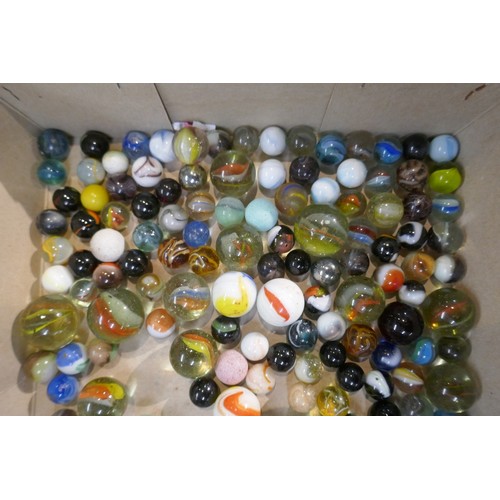 227 - Tin of vintage marbles