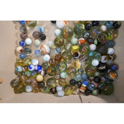 227 - Tin of vintage marbles