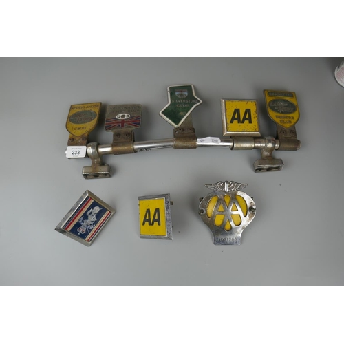 233 - Collection of car badges to include AA, Land Rover, Silverstone etc