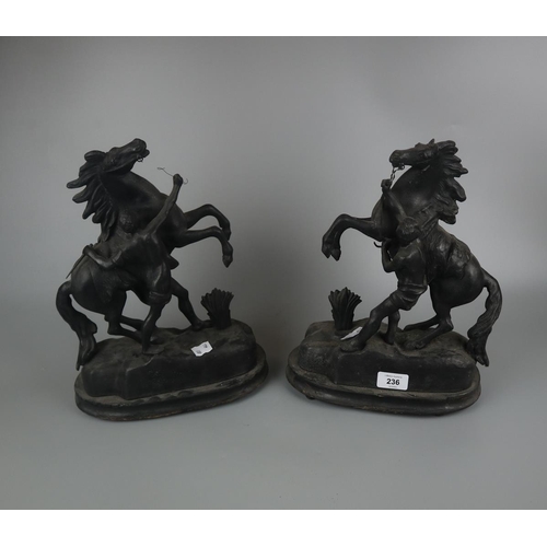 236 - Pair of statues - Man rearing horse - Approx height: 34cm