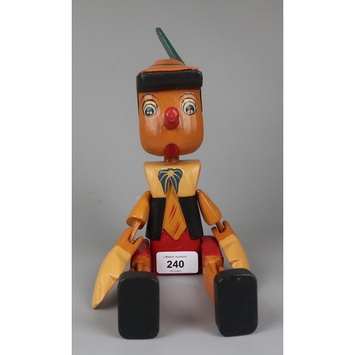 240 - Articulated wooden Pinocchio