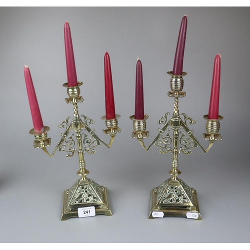 241 - Pair of brass candelabra to include candles