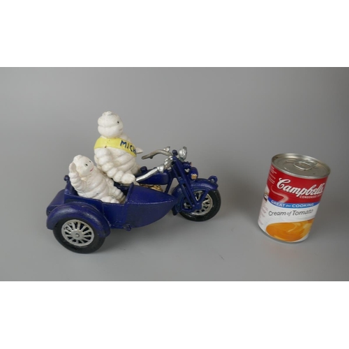 243 - Cast iron Michelin man motorcycle and side car figure