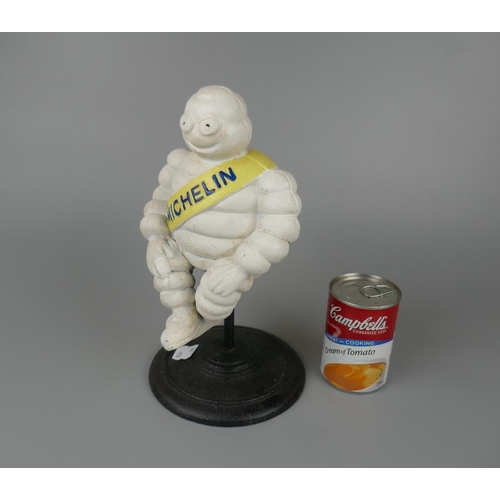 245 - Cast iron Michelin man on spinning stool