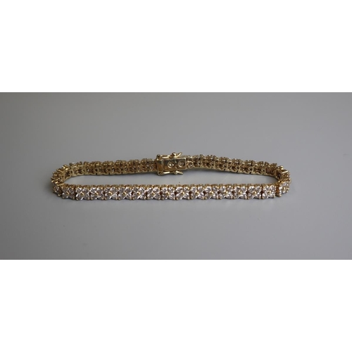 28 - Fine 18ct gold diamond tennis bracelet - Approx weight 15.5g