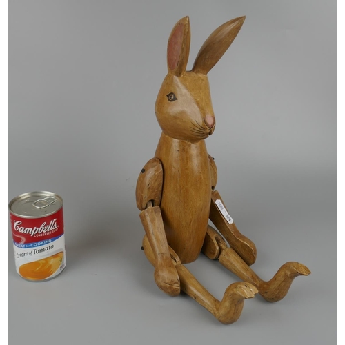 489 - Wooden articulated rabbit figure