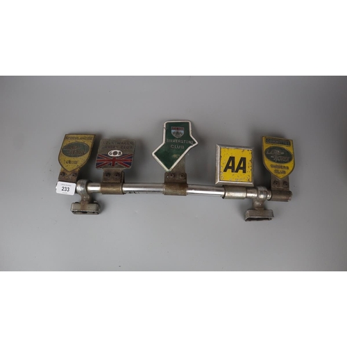 233 - Collection of car badges to include AA, Land Rover, Silverstone etc