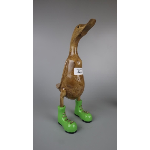 238 - 2 wooden ducks in boots