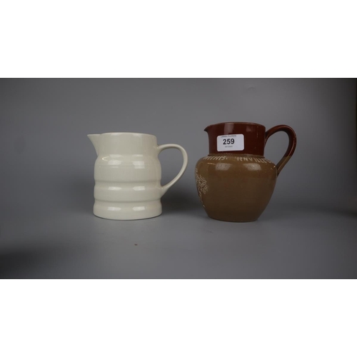 259 - Collection of jugs to include Royal Doulton Harvest jugs and Cadburys cocoa jug etc